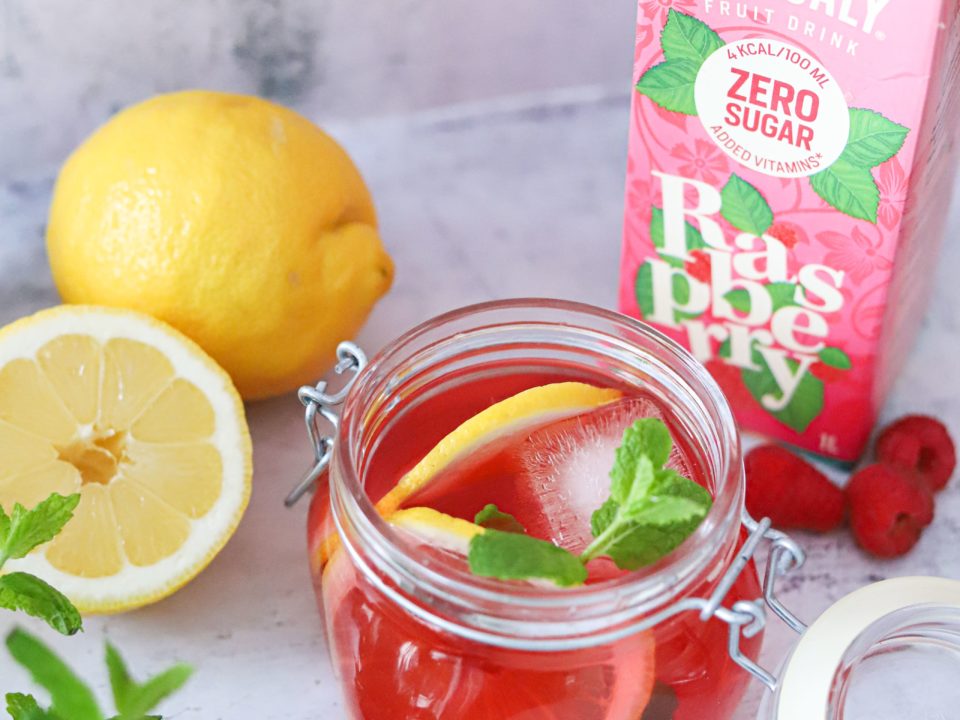Image for a sparkling raspberry lemonade recipe containing products from NJIE's Lowcaly brand.
